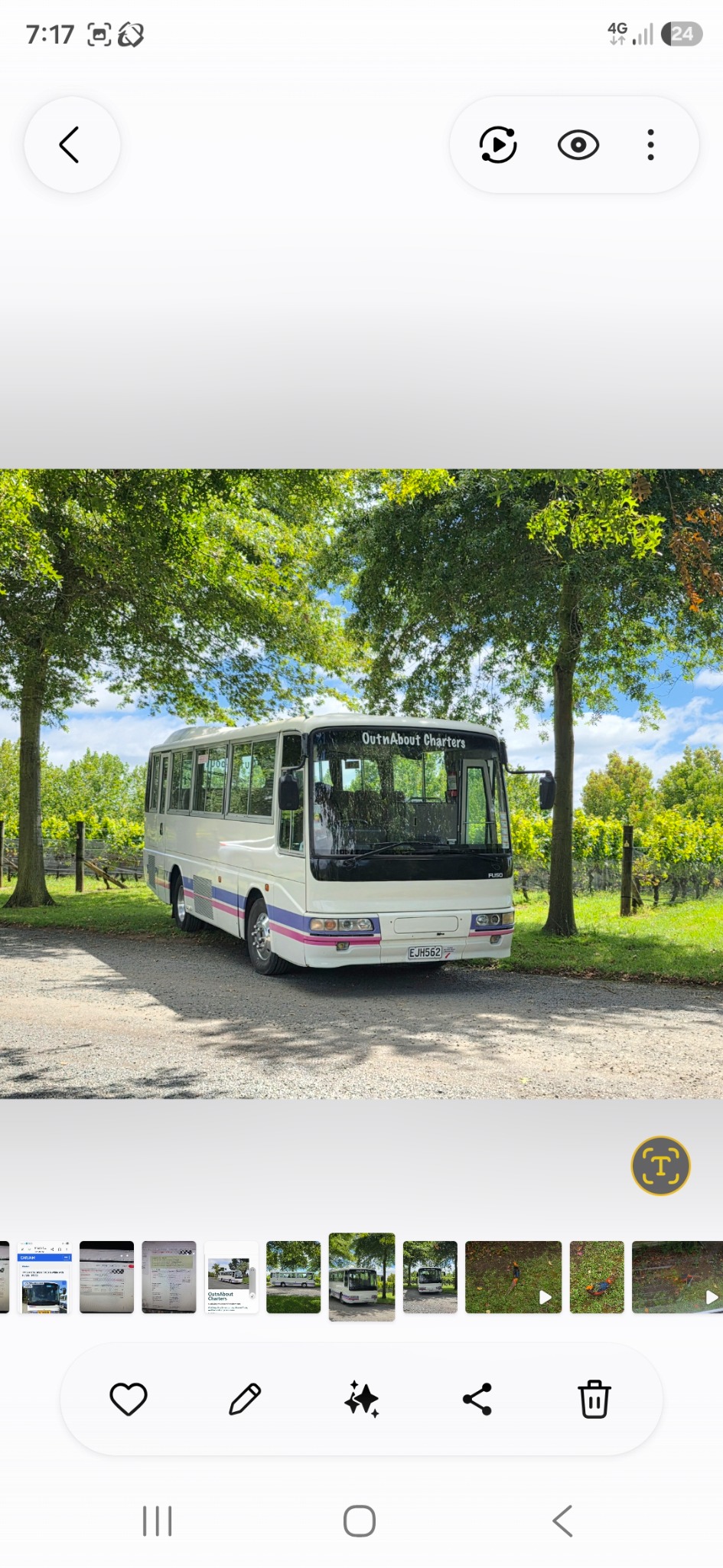 Our 28-seat Mitsubishi Fuso, front and side view showing the complete bumper